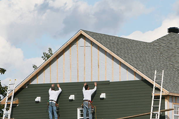 Professional Siding Installation technician working in Madison, IL